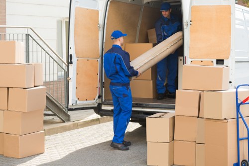 House movers navigating a Westminster street with parking restrictions