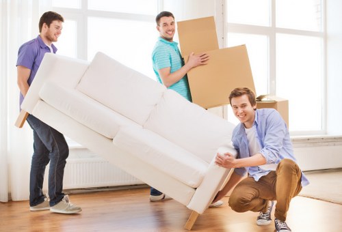 Removal team handling access and loading for a central London property