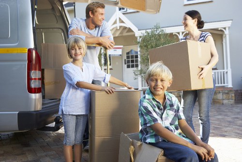 Packed boxes and furniture prepared for a Westminster flat move
