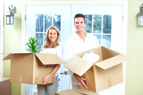 Loading furniture into a moving truck in Westminster