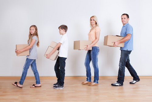 Packing and loading items into a moving van in Westminster