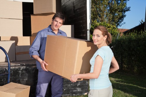Furniture and boxes being loaded into a removals van in Westminster